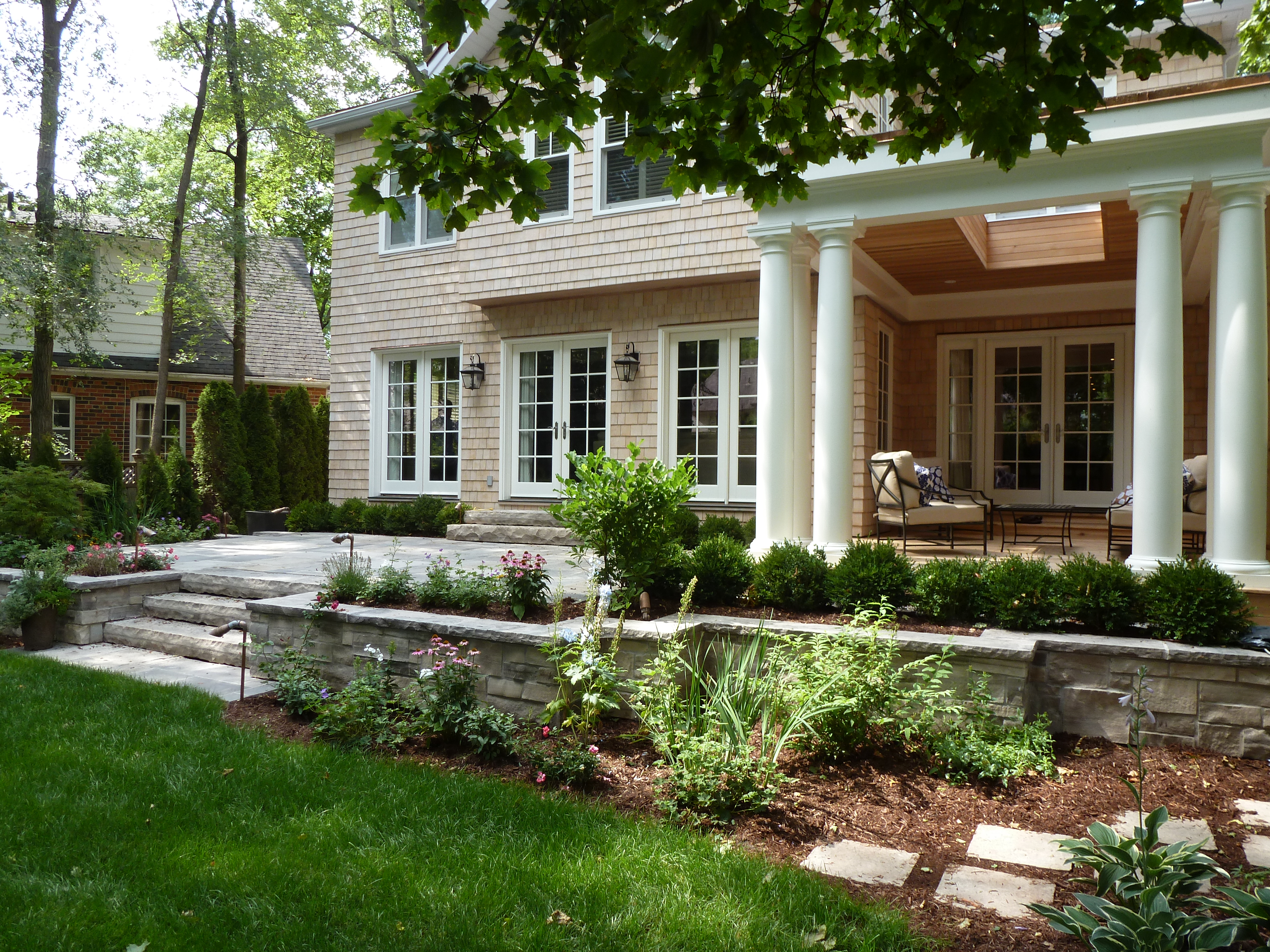 addition-raised-stone-patio